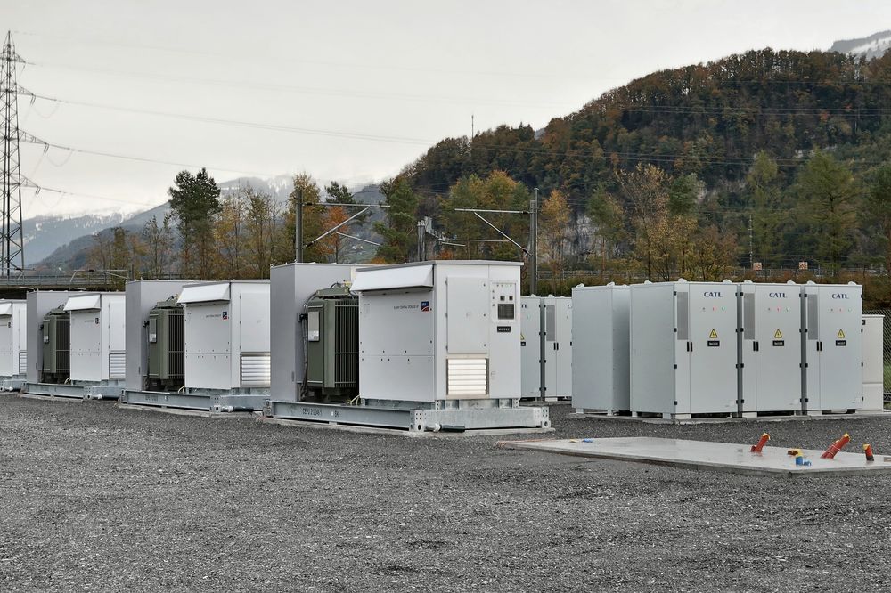 Outdoor battery storage cabinets installed at a roadside site